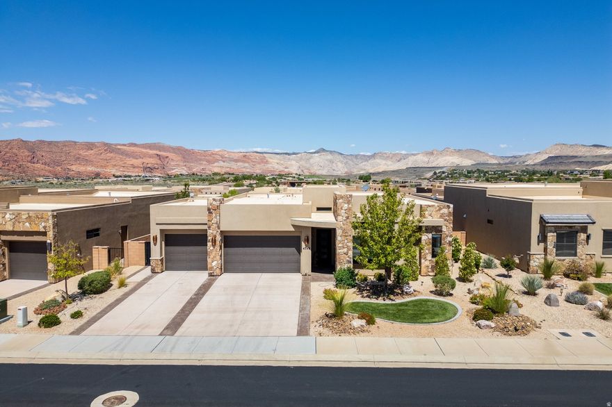 Located in the highly desirable The Ledges of St. George, this 4-bedroom, 2-bath home offers a clean, move-in-ready feel with fresh interior paint and brand-new carpet throughout. The open, functional layout is designed for easy everyday living and comfortable entertaining.  Just minutes from the golf course and surrounded by one of St. George's premier communities, this home is a great fit for a full-time residence or a low-maintenance second home-with a touch of Snow Canyon scenery to top it off.