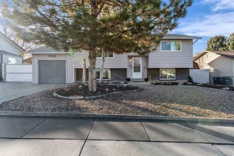 Photo of 3622 S CHATTERLEIGH RD W, West Valley City, UT 84128 (MLS # 2122097)