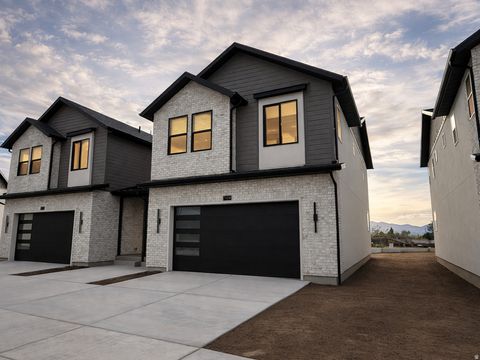 Photo of 6708 S VAUGHN LN E #25, Midvale, UT 84047 (MLS # 2149950)