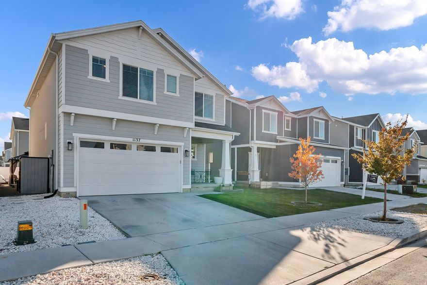 *Double OPEN HOUSE Saturday December 6th from 12-2 pm with MLS# 2088178 - 464 S Highpoint Dr, Saratoga Springs (5 min away) - 2 FREE movie tickets for those who walk through both Open Houses* NOW OFFERING $5,000 in Closing Costs if sold before end of 2025! Welcome home - this thoughtfully designed Northshore home seamlessly blends style, comfort, and functionality! The rare Clover floor plan features three spacious bedrooms upstairs, including a primary suite with a walk-in closet, a versatile loft, and a beautifully finished basement that can accommodate a fourth bedroom.The open-concept main floor boasts wide hallways and premium laminate flooring leading into a highly upgraded kitchen with sleek white cabinets, modern quartz countertops, and stainless steel appliances. Natural light fills the living area, creating an inviting atmosphere.The newly finished basement includes a stylish full bathroom and ample flex space suitable for guests, a home office, or a media room. (The seller is open to enclosing a fourth bedroom/flex space with the right offer.) The washer, dryer, and refrigerator are negotiable. Enjoy the outdoors with an extended patio, pergola, privacy fencing, and a cozy fire feature-ideal for relaxation or hosting gatherings. Conveniently located just 8 minutes from I-15, this property resides in the desirable Northshore master-planned community, which offers resort-style amenities including a clubhouse, pool, splash pad, parks, sports courts, and scenic walking trails.Additionally, the new Saratoga Springs North Marina, featuring a boat launch, sports fishing jetty, pavilions, waterfront trails, and enhanced lake access, is being developed nearby, providing even more recreational opportunities. Meticulously maintained and upgraded throughout, this home combines modern design, functionality, and convenience in one exceptional package. Buyer to verify all information.