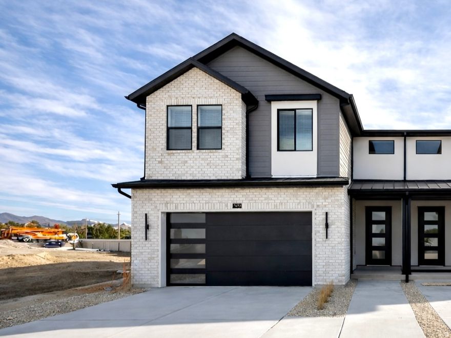 New construction in Trailside Reserve - a modern, low-maintenance community in the heart of Midvale. This stylish twin home lives like a single-family with an open great room, fireplace insert, quartz countertops, blinds included, and vaulted ceilings. Estimated completion early March, with EV-ready garage, private fenced backyard, and HOA-maintained exterior and snow removal for easy living. Virtually staged; photos may vary by unit.