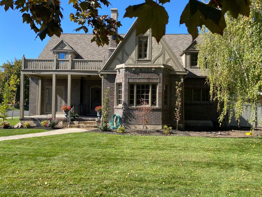 ICONIC historic home on Springville Main Street. This home was designed by the renowned Claude S Ashworth who also designed the Art Museum. Built by well known Springville Business Tycoon, H.T. Reynolds and was in the family until a few years ago. The home has had extensive remodeling and updating. The original charm and artistry have been accentuated and rejuvenated. Quarter-sawn oak floors and doors and gorgeous staircase are refinished flawlessly. Woodwork galore, some real wood and some meticulously painted to look like wood (a lost art only seen in historic homes of this period) built-ins, leaded glass, tall ceilings, beautiful original windows, arched entries, pink formica bathroom that is to die for! Still wavy glass in window panes and a beautiful fireplace with original tile and Pioneer motif graces the spacious parlor with a birds-eye-view of Main Street and the going's on. There is a very large basement that would be great for a workshop or storage or some type of production type business. It is located in a commercial zone and historic district. perfect for a professional law office or the likes. Plenty of room in back for parking or workshop or enlarge the garage. OR just enjoy living in this historic masterpiece in all it's glory! Commercial Zoning is done or leave it residential. OWNER/AGENT
