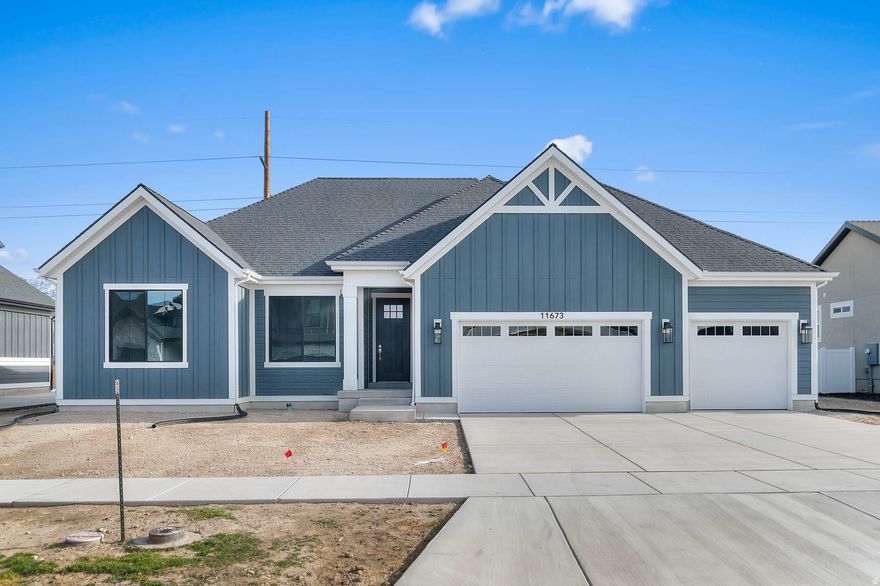 Come see this beautiful brand new Torino Farmhouse, a stunning home combining farmhouse charm with modern luxury. The kitchen features maple cabinets with large crown molding and LED lighting, quartz countertops, stainless steel gas appliances, tile backsplash, and pendant lighting above the island, creating an inviting space for entertaining. Enjoy spacious living with 9-foot basement foundation walls, a walk-up basement door, and a 3-car garage with an exit door. The design includes box windows in the kitchen nook and owner's bedroom, textured walls, 2-tone paint, and Entrada base and casing for an elegant finish. Additional highlights include can lighting, a Christmas light package, gas line to the dryer and BBQ, radon system, and a gas log fireplace in the family room for cozy evenings. The office with French doors adds functionality in place of a fourth bedroom, while the owner's bathroom showcases tile surrounds and chrome hardware, completing this beautifully detailed and thoughtfully designed farmhouse.