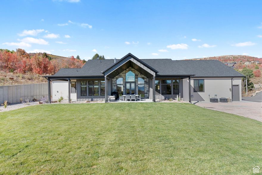 Beautiful new home located in a quiet cul-de-sac in Eagle Feather at Shundahai. Surrounded by pines and quakies with views of BEAR LAKE.   Features 8 bedrooms and 8 bathrooms--most are en - suite, two living rooms--both with fireplaces, open concept with covered deck and patio. Area above garage is a one bedroom suite with wet bar/mini kitchen--ADU. Short term rentals allowed.  Beaver Mountain 15 min; downtown Garden City and State Park marina 5 min; The Sinks Trailhead 5 min. Square footage figures are provided as a courtesy estimate only and were obtained from apprasider sketch .  Buyer is advised to obtain an independent measurement. Appraised value of $1,805,000.
