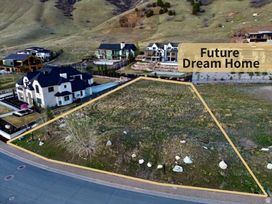 Nestled at the breathtaking entrance of Big Cottonwood Canyon, this premier homesite in the exclusive Tavaci community presents an incredible opportunity to create a legendary property. Hidden behind private gates and enveloped by stunning mountain vistas, this .63-acre lot offers a perfect blend of seclusion and effortless access to all the wonders Salt Lake City has to offer.  Imagine waking up to towering canyon walls, fresh alpine air, and endless outdoor adventures just minutes away. Whether you're a skiing enthusiast, hiker, or someone who loves escaping the summer heat, this location puts exhilarating experiences right at your doorstep, while still being only a short drive to the city.  Tavaci is celebrated for its luxury, privacy, and striking architecture. This lot provides a blank canvas to design a custom estate that reflects the community's high standards. And guess what? You'll be just across the canyon from global superstar Post Malone-because ordinary neighbors simply won't do it here.  If you've been dreaming of a lot that makes people say, "I wish I had this life," this is your moment. Build something unforgettable in one of Utah's most highly coveted canyon communities.  optionally, We are currently working with Salt Lake Parade of homes builder, T.A. Kirton Custom Homes to draft custom home plans designed for this lot. They will be included in the purchase if you build the home with them!