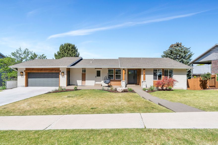 Beautifully updated east bench home in Provo offering ideal multigenerational living with separate main floor and basement walk-out living spaces. The main level features 3 bedrooms, 2.5 bathrooms, laundry, updated kitchen, spacious living and dining areas, and abundant natural light throughout. The fully finished walk-out basement includes 3 additional bedrooms, 2 bathrooms, full kitchen, laundry, dining and living areas, plus a game room-perfect for extended family, guests, or rental potential. Enjoy stunning mountain and lake views from the deck and patio. Additional features include a 2-car garage, 2 storage sheds, and a highly desirable Provo east bench location. Square footage figures are provided as a courtesy estimate only and were obtained from County Records. Buyer to verify all.
