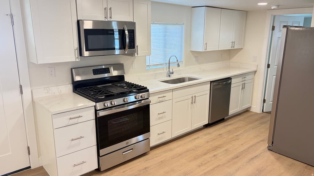 Photo of 764 W MONTE BLANCO ST #102, Taylorsville, UT 84123 (MLS # 2174036)