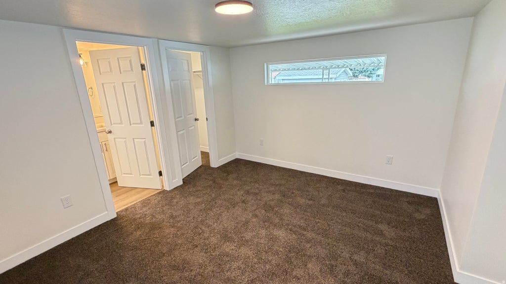 Photo of 764 W MONTE BLANCO ST #102, Taylorsville, UT 84123 (MLS # 2174036)