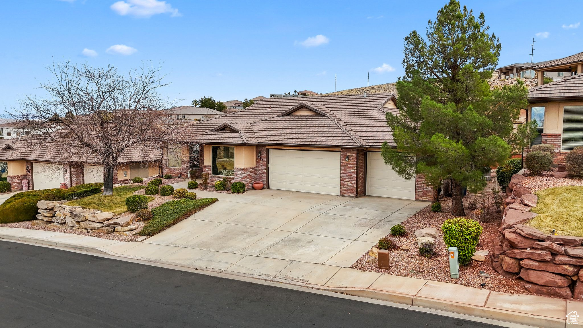 This beautifully maintained home offers a serene backyard retreat featuring a charming rock fountain and an outdoor bar area, perfect for outdoor dining. The front entryway is inviting, enhanced by lush landscaping and mature trees. Inside, you will find vaulted ceilings throughout the living area, creating an open and airy atmosphere. The semi-formal dining room provides ample space for gatherings. The open kitchen boasts numerous cabinets and a large pantry for all your storage needs. The extra-large master suite includes a walk-in closet with built-in cabinets and offers a separate jetted tub and shower for your relaxation. There are also two additional bedrooms that provide comfortable living spaces and extra closet space. This prime location offers easy access to I-15, with nearby restaurants and shopping available. Enjoy exploring the great outdoors with hiking and biking trails in the Red Cliffs Desert Reserve, or take a swing at the nearby Southgate Golf Course. Please note that the square footage figures are provided as a courtesy estimate and were obtained from the Washington County Recorder's office. Buyers are advised to obtain an independent measurement.