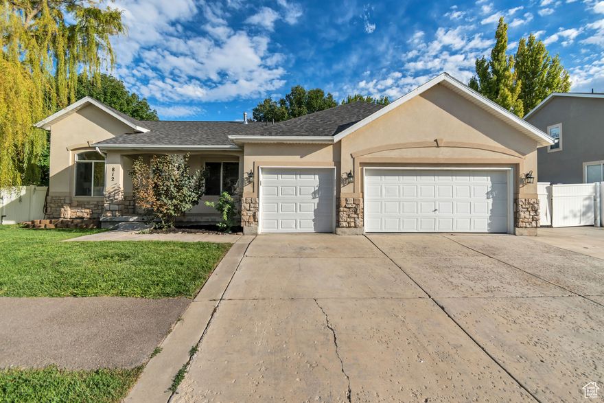 Welcome to this beautiful 5 bed, 2.5 bath home near Utah Lake in one of Saratoga Springs most desirable neighborhoods! Freshly painted with new basement flooring, new master shower and an industrial AC unit for year-round comfort. Enjoy a 3-car garage, RV parking, and garden boxes for homegrown produce. The HOA offers resort-style living with 2 clubhouses, 2 gyms, a heated pool/spa, and a hot springs pool/spa along with other opportunities for recreation - perfect for fun and relaxation.   Square footage figures are provided as a courtesy estimate only and were obtained from county records.  Buyer is advised to obtain an independent measurement.
