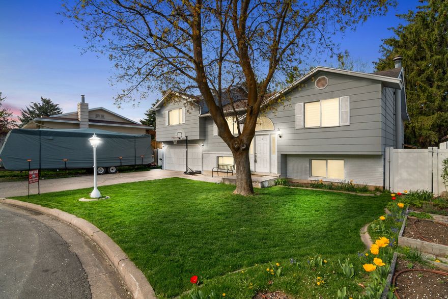 Tucked away on a highly desirable cliffside cul-de-sac, this beautifully remodeled home features a stunning open-concept layout, a cozy fireplace, a beautifully updated kitchen featuring granite countertops. With Huge family spaces, and a massive master bedroom, there is abundant room to entertain, host gatherings, or simply relax.   Beautiful custom window treatments perfectly frame the space, while a new furnace and AC system (installed in 2020) and a smart thermostat guarantee year-round comfort.  Private, fenced back yard with full sprinkler system, brand-new decks, and dedicated concrete pad for hot tub.