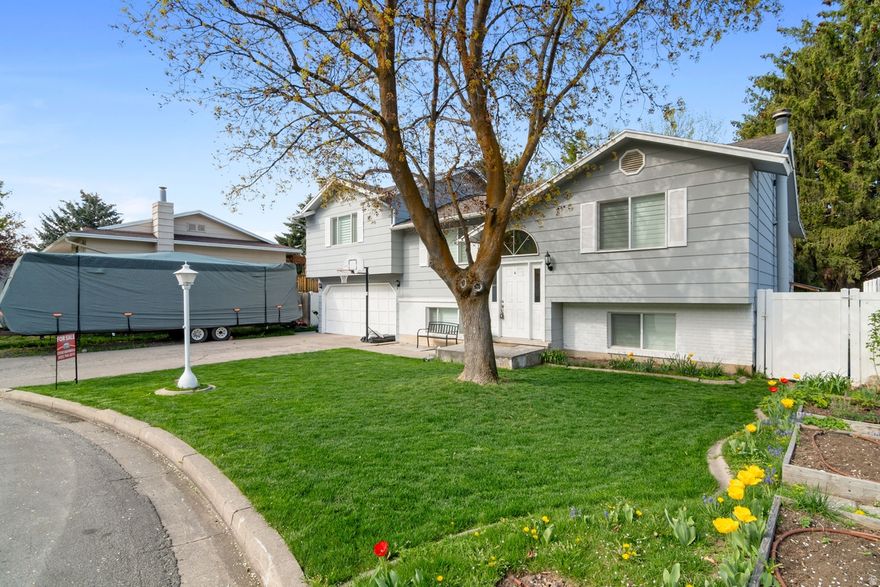 Tucked away on a highly desirable cliffside cul-de-sac, this beautifully remodeled home features a stunning open-concept layout, a cozy fireplace, a beautifully updated kitchen featuring granite countertops. With Huge family spaces, and a massive master bedroom, there is abundant room to entertain, host gatherings, or simply relax.   Beautiful custom window treatments perfectly frame the space, while a new furnace and AC system (installed in 2020) and a smart thermostat guarantee year-round comfort.  Private, fenced back yard with full sprinkler system, brand-new decks, and dedicated concrete pad for hot tub.