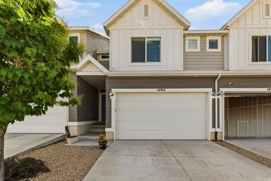 Beautifully maintained townhouse located in the heart of Herriman! This modern home offers an open concept layout with spacious living areas, abundant natural light, and stylish finishes throughout. The kitchen features quartz countertops, stainless steel appliances, contemporary cabinetry, ample counter space, and a functional layout perfect for entertaining. Beautiful LVP flooring, plantation shutters, smart home features, and an integrated security system add comfort and convenience throughout the home. The spacious primary suite features a private ensuite bathroom and dual his and hers walk in closets. This home also includes a fully finished  basement (Studio Apartment) complete with a wet bar, offering additional living space and flexibility for guests, entertaining, or multigenerational living. Enjoy the fully fenced private patio, perfect and ready for barbecues, relaxing, or entertaining outdoors. The attached garage features professionally finished epoxy flooring and built in wall storage, providing both a clean polished look and excellent additional storage space. Conveniently located near parks, shopping, dining, schools, Salt Lake Community College, Mountain View Corridor, and the rapidly growing Mountain View Village area with premier shopping, entertainment, and dining. Enjoy easy access to everyday conveniences with the new upcoming Target and Trader Joe's coming soon nearby, along with continued retail and commercial growth throughout Herriman and the southwest valley.