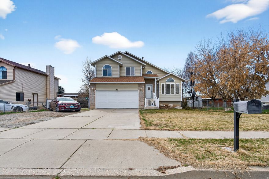 This well-cared for home is ready for it's next owner! This home has received new flooring, furnace, water heater, and all-new windows just 2 years ago. The big stuff is done, so you can just move in and enjoy. The kitchen is bright and open with vaulted ceilings - and the sliding door takes you straight out to the covered deck. The living room has a great brick fireplace for those colder nights, and the finished lower level gives you the extra space everyone's always looking for. Out back, the mature trees naturally shade and tuck the yard away. Whether it's a backyard BBQ or your morning coffee on the deck, this backyard delivers. Come see it before someone else does! Square footage figures are provided as a courtesy estimate only and were obtained from Davis County. Buyer is advised to obtain an independent measurement.