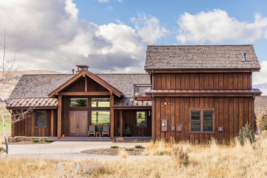 Positioned to capture golf course views and the iconic ski runs of Deer Valley Resort, this 3,800 square-foot Expanded Juniper Cabin offers mountain living with custom upgrades throughout. Featuring 5 bedrooms and 5.5 baths, the home blends thoughtful design with comfortable gathering spaces and easy access to Victory Ranch's exceptional amenities. The open-concept main level  features a spacious great room and chef's kitchen, where expansive windows frame breathtaking fairway and mountain vistas. With convenient access to golf, dining, trails, and year-round recreation within Victory Ranch, this exceptional cabin delivers the perfect blend of luxury, views, and lifestyle. Victory Ranch is a private, four-season community amidst 6,250 pristine acres along four miles of the Upper Provo River. Amenities include an 18-hole Rees Jones golf course, world-class fly-fishing, miles of mountain biking and hiking trails, 5-stand shooting facility, 4x4 adventures, snowmobiles, ice skating rink, backcountry yurts, fishing ponds, multiple restaurants, a ski-in/ski-out lodge in Park City and more than 3,500 acres of untouched backcountry. The Post Clubhouse includes our concierge, heated pool, hot tubs, fire pit and seasonal grill. Our newest amenity, The Barn, features a Pizza and Ice Cream Parlor, Art Studio, Game Room and Indoor Basketball and Sport Court as well as a Fitness Center, and Spa. The new swimming pool, waterslide, tranquil stream and pond, tennis, pickle and paddle courts, and event lawn will be sure to provide hours of family fun. Victory Ranch is approximately 15-minutes from Deer Valley and 25 minutes to Park City.