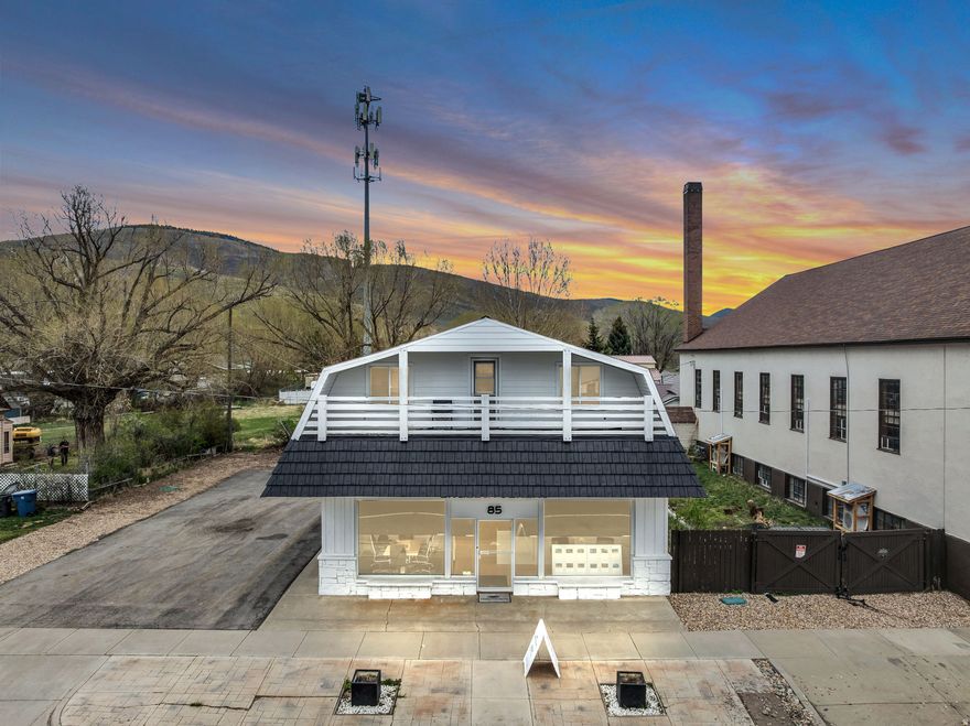 Anchored on the most visible stretch of Kamas Main Street - steps from Bolt Ranch, Mirror Lake Diner, and across from Summit Pizza - this mixed-use gem sits at the literal and figurative entrance to the Uinta Mountains, one of Utah's most beloved recreational corridors. The property offers two distinct income streams under one roof: a freshly remodeled commercial suite (approx. 1,546 sq ft, updated in 2022) currently operating as a real estate office, paired with a spacious 3-bedroom, 1-bathroom residential apartment (approx. 1,543 sq ft) - nearly 3,100 square feet of total space with endless potential. Whether you envision a boutique storefront, professional office, or live-work lifestyle with rental income, the bones and the location make it undeniable. This isn't just a building - it's a front-row seat to everything that makes Kamas Valley extraordinary.