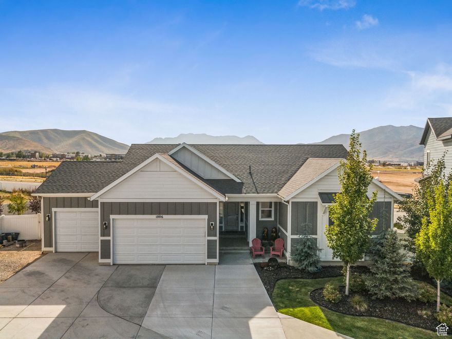 5 bds/3 baths, cul-de-sac home with Timpanogos views.   Tucked away on a quiet cul-de-sac, this Heber City home (built in 2021), combines the best of modern construction with thoughtful upgrades. Step inside and enjoy soaring tall ceilings on both levels, giving the home an open, airy feel. The gourmet kitchen is a valid focal point for the living room, featuring granite countertops, upgraded alder cabinetry, and prewired for upper and under cabinet lighting. Don't forget about the pull-out drawers and soft-close cabinet doors, as this is a very nice feature to have. The oversized island offers both storage and extra seating, perfect for gatherings. Don't overlook the walk-in pantry.   The spacious primary suite is a retreat of its own, with a modern fireplace and a walkout to a beautiful deck. The primary has a luxurious soaking tub, a separate shower, and a well-designed layout that feels both elegant and relaxing.   Downstairs, the newly finished basement is made for company, complete with a beautiful entertainment bar, a full bathroom, and three bedrooms with generous closets. The HVAC system consists of Smart and practical features that abound, including ENERGY STAR heating & cooling. This house has plenty of storage for all your seasonal items in both the garage and the extra storage downstairs.    Outside, the backyard is designed for enjoyment, featuring new landscaping, a surrounding fence, a charming deck perfect for afternoon dinner parties, as well as a pre-built foundation for a hot tub. There is even an RV parking site that has power adjoining it. Oversized three-car garage and sizable storage in the garage  This home offers the ideal balance of modern finishes, energy-efficient upgrades, and outdoor beauty- all in a prime Heber location with unparalleled views of Mt. Timpanogos.   Square footage figures are provided as a courtesy estimate only. Buyer is advised to obtain an independent measurement.