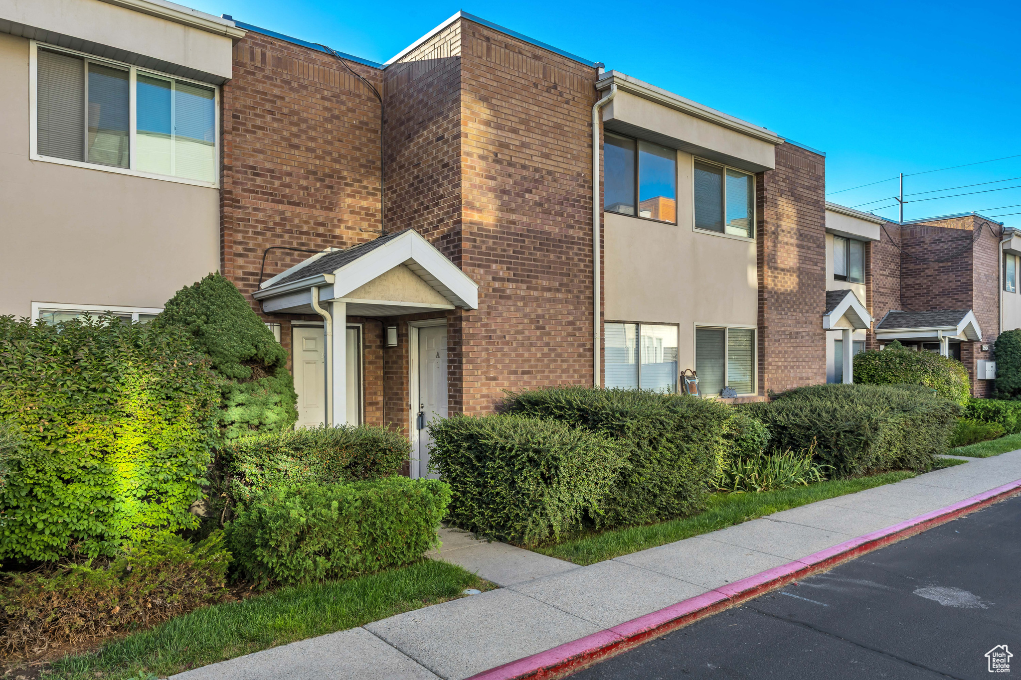 Conveniently located townhome-style condo with a private patio and spacious areas for pets right outside your main-level kitchen sliding glass door. Enjoy hassle-free living with water, sewer, trash, and maintenance covered by the HOA. Centrally located near shopping and public transit. New carpet and extra storage on the main level. Clean and move-in ready with quick access to shopping, dining, mountain recreation, and Parleys Canyon, I-15, and I-215, making travel to ski resorts and downtown effortless. FHA spot approval available. HOA is currently working to plant resod beyond the patio where dirt is pictured.