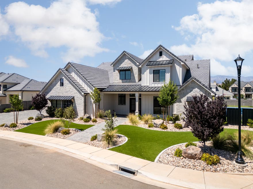 Remarkable & timeless home in the desirable Queensridge neighborhood. Expansive yard on just under 1/2 acre with pickleball & basketball court, saltwater pool with spa & motorized cover, mature palm trees & big turf area. Rare 2046 sq ft garage, with a 14' tall RV door & 50' deep. Chef's kitchen with professional grade Monogram appliance package, dual dishwashers, butler's pantry & 12' sliding glass door in the great room creating fantastic indoor-outdoor living. 10' ceilings on both floors, complete with an office & second bedroom on the main floor. Primary bedroom features a 12' sliding glass door, a spa-like bathroom & custom closet system. Large living room upstairs + a dedicated laundry room. Excellent upgrades throughout including, motorized blinds, plantation shutters & ample storage. Owner Agent.