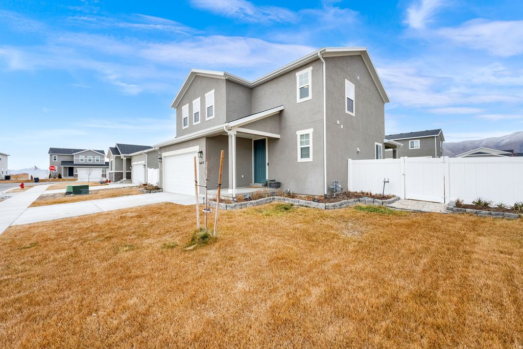 Photo of 6412 N WILD MARE WAY W #1022, Stansbury Park, UT 84074 (MLS # 2137005)