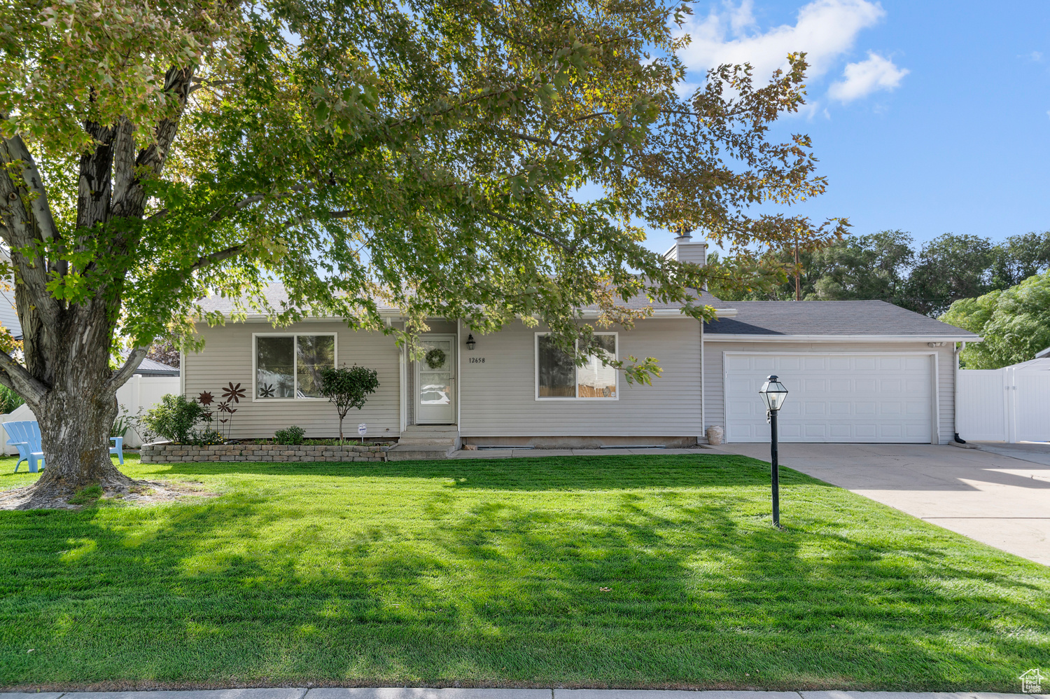 NEW ROOF OCT 20th! Welcome to this charming traditional rambler tucked away on a quiet cul-de-sac in a great Riverton neighborhood. With 3 bedrooms, 2 baths, and nearly 1,900 sq ft, this home blends comfort with thoughtful updates-perfect for your next chapter. Inside, you'll find an open-concept kitchen with stainless steel appliances, and modern finishes throughout. A bright family room and spacious layout make it easy to enjoy both everyday living and entertaining. The beautifully landscaped, fully fenced yard is a highlight, offering privacy and room to play, garden, or relax. With a full basement, attached garage with workshop space, and clean, move-in ready condition, this home is the perfect fresh start in Riverton.