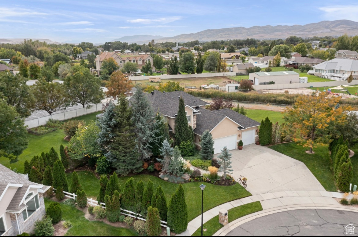 Tucked away on a quiet cul-de-sac in The Links at Riverbend, this two-story home with a finished basement sits on a spacious .67-acre lot in a peaceful Riverton neighborhood. The home offers 6 bedrooms, 3.5 bathrooms, and nearly 4,000 sq ft of living space. The main level includes a primary suite with a full bath, a half bath for guests, and an open kitchen with granite countertops and plenty of cabinet space. Upstairs you'll find additional bedrooms and another full bath, while the newly finished basement adds a family room, full bath, and extra space. Recent updates include new carpet throughout most of the home. Other highlights include tall ceilings, plantation shutters, a large deck, full landscaping, and an oversized 3-car garage. Quiet street, big lot, and move-in ready condition. This home checks all the boxes.