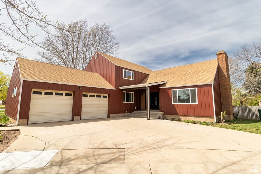 Welcome to your dream home in one of Roy's most secluded neighborhoods-tucked away yet minutes from I-15 and I-84 for a smooth commute. This 5-bedroom, 3-bath beauty sits proudly on a corner lot and is packed with high-end upgrades throughout.  Enjoy brand new smart siding, double-pane vinyl windows, fresh two-tone paint, premium carpet and pad, updated baseboards, and sleek new counters. A salon space on the main level offers a perfect setup for home-based business or flex room needs. Cozy up by the fireplace, host in the formal dining room, or unwind on the private master deck overlooking your secluded backyard.  With two large family rooms, mountain views, and a layout designed for comfort and flow, this one truly has it all. Homes like this don't come up often-here's your chance to be our neighbor. Come see why this one's a showstopper!    Square footage figures are provided as a courtesy estimate only and were obtained from a listing appraisal.  Buyer is advised to obtain an independent measurement.