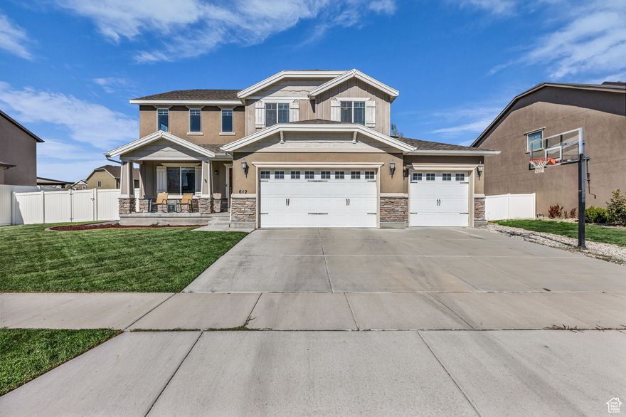 This stunning 4-bedroom, 3-bathroom home offers comfortable living space on a beautifully landscaped lot. Meticulously cared for inside and out, the property boasts incredible curb appeal, with a lush yard and inviting exterior that sets the tone as soon as you arrive. The spacious layout provides plenty of room for everyone! Enjoy entertaining in your open designed kitchen, bright living areas, and comfortable bedrooms that make everyday living a joy. Yard is well maintained and complete with a basketball hoop, perfect for outdoor fun and gatherings. Jellyfish exterior lighting. Located in the heart of Stansbury Park, near community parks, the Benson Grist Mill where most locals spend their Saturday hosting the local farmers market, and near the school's within Stansbury, including the new Stansbury Junior High.    Square footage figures are provided as a courtesy estimate only. Buyer is advised to obtain an independent measurement.