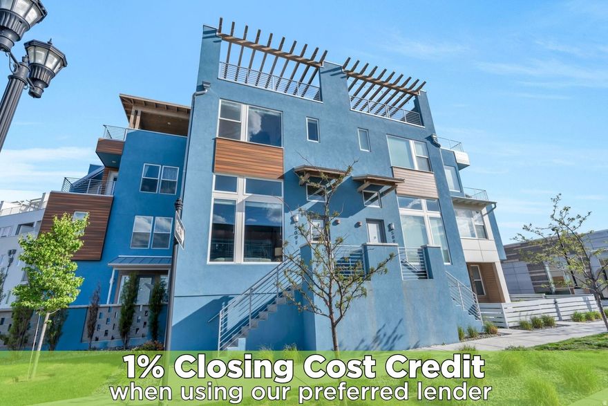 Welcome to this exceptional Daybreak townhome, featuring the highly sought-after Grand Slam floor plan by Sego Homes, offering elevated living and incredible design throughout,  with a stunning rooftop terrace showcasing sweeping views to the East and North ends of the valley. Designed for both relaxation and entertaining, the upper-level "sky room" features a convenient wet bar and opens directly to the terrace, creating the perfect space to unwind or host guests.  The rooftop terrace is thoughtfully designed with added structural support to accommodate a hot tub and is equipped with a gas line, electrical hookup, and hose spigot, providing incredible flexibility to create your own private outdoor retreat.  This home stands out with the natural light and window placement of an end unit, enhanced by massive windows and a multi-level layout that allows sunlight to pour in throughout. The interior is beautifully maintained and thoughtfully designed with stylish three-tone paint, adding depth and character to each space. Retreat to the spacious primary suite featuring a large walk-in closet with a striking accent barn door, and an ensuite bathroom complete with a double vanity and granite countertops.  The open-concept living areas flow seamlessly, while the lower level offers flexibility with the potential for a fourth bedroom, office, or additional living space. Comfort is maximized year-round with two HVAC systems for efficient temperature control.  Ideally located at the end of the Red TRAX line, with the Ballpark and Downtown Daybreak just one stop away, this home combines convenience with a vibrant lifestyle. Enjoy all that Daybreak has to offer, including Oquirrh Lake, over 30 miles of walking and biking trails, parks, playgrounds, community events, pools, and more.  This is a rare opportunity to own a light-filled, meticulously cared-for home with standout indoor and outdoor living spaces in one of Daybreak's most vibrant locations.