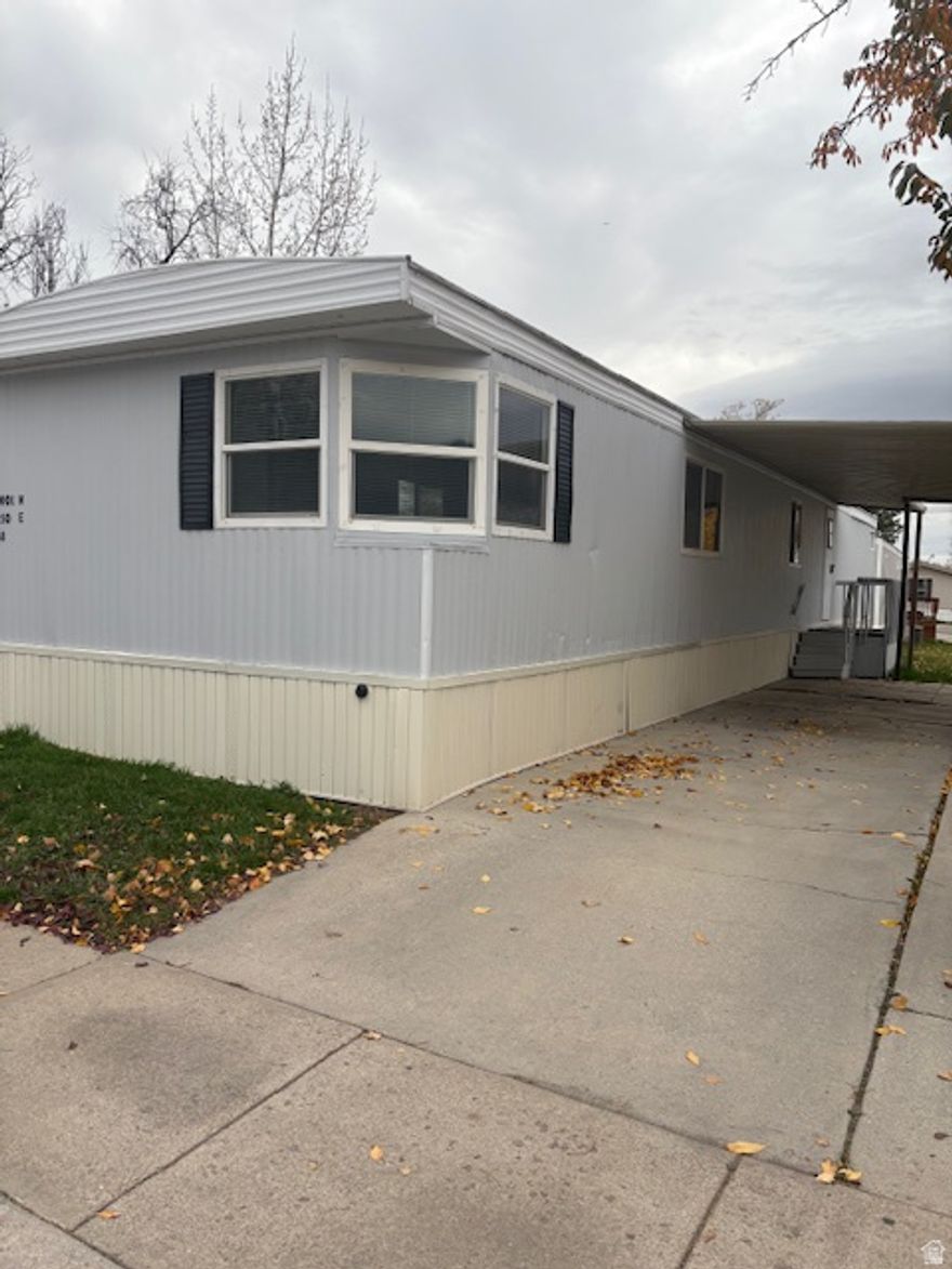 This home has all new paint and new flooring with 3 bedrooms 2 bathrooms covered deck and covered parking  in a family friendly mobile home park. Close to shopping, schools, dinning. To view this home call agent for an appointment home is vacant and easy to show