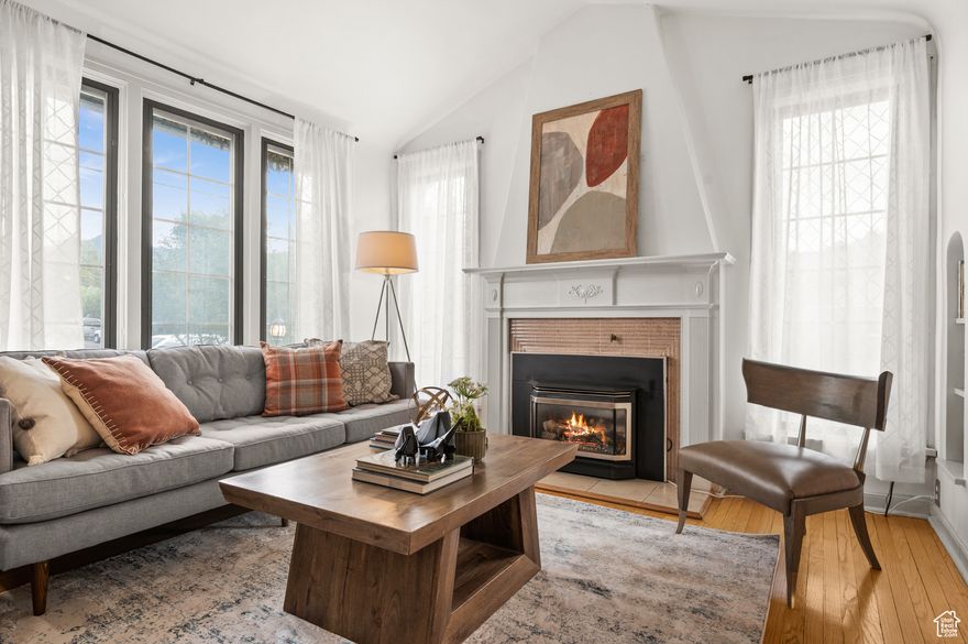 This charming Tudor-style home, boasting three bedrooms, two baths, and a two-car garage, sits proudly on a spacious corner lot. With hardwood floors, a cozy kitchen, and a sweet breakfast nook, it's perfect for everyday living. Just steps from the vibrant shops and restaurants in the heart of the 15th and 15th neighborhood, it's also a short stroll to Sugar House Park and a quick bike ride to downtown Sugar House or the 9th and 9th area.  area. Nestled on a tree lined street, one of the town's finest spots, this home is a true gem!  Square footage figures are provided as a courtesy estimate only.  Buyer is advised to obtain an independent measurement.