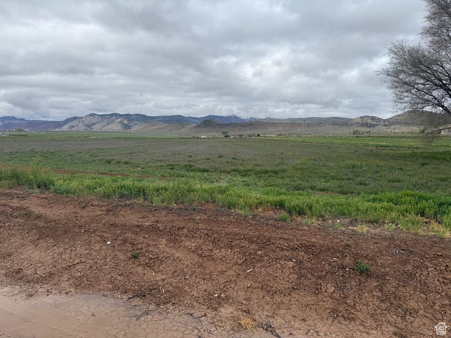 .29 acres of level, buildable land. Connections to water, power and possibly gas, depending on City regulations. South end of city. Zoned residential. Perfect for building your dream home. This lot has beautiful mountain views and lots of fresh air. Utility installation starting immediately. All addresses appropriate. City to address at a later date.