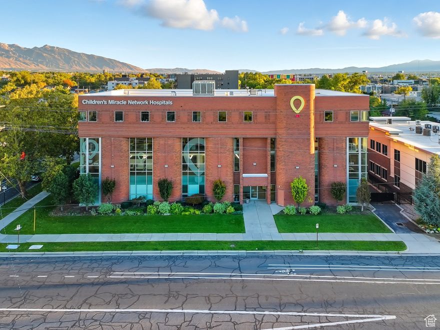 The Children's Miracle Network building is an extremely well-maintained  building positioned only minutes from downtown Salt Lake City and the CBD.  With immediate access to I-15 and I-80 and conveniently located next to a UTA Trax Station at the edge of the Granary District, it is within walking distance to the downtown core and endless amenities.  The property benefits from its proximity to many of the city's fastest-growing creative and mixed-use neighborhoods. Surrounded by transitioning districts with new multifamily, retail, and adaptive-reuse projects, this building offers excellent visibility, flexible office layouts, and strong long-term investment potential in a dynamic growth corridor.