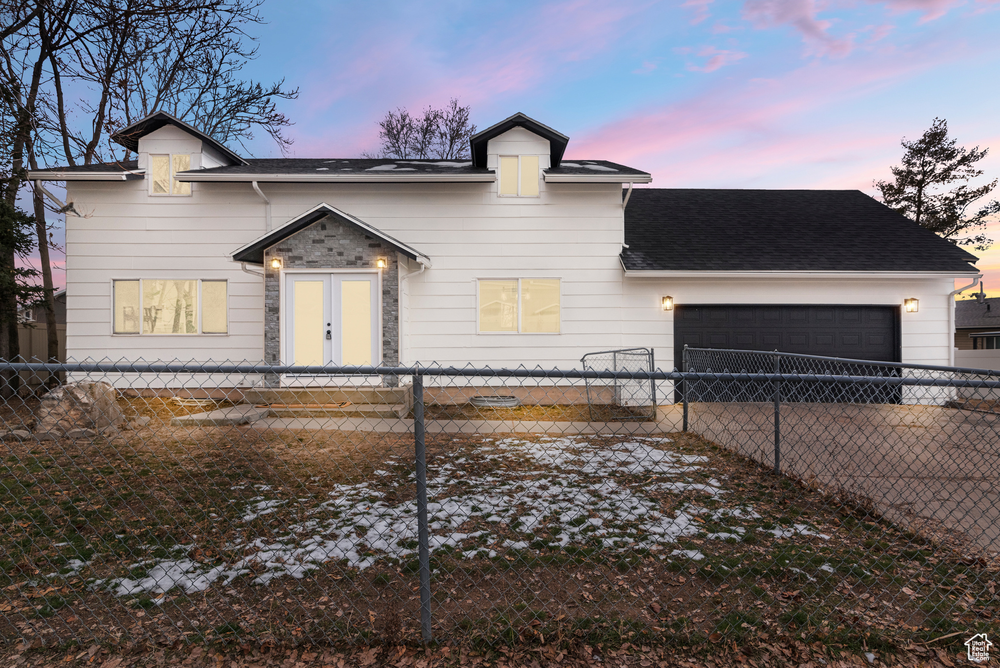 Completely remodeled Clearfield house is ready for a new owner AND you could rent out the basement (has a separate entrance), including its own W/D hookups and a new kitchen.  So much home for less than $500k! There are so many brand new aspects of this home: Furnace & AC, 25-year roof, flooring, paint, light fixtures and updated bathrooms. Solar panels were installed 4 years ago (paid off!) so enjoy a lower power bill. Both kitchens have been meticulously updated with new cabinets (basement), quartz countertops, and appliances. Home is set up nicely with 4 bedrooms and 2.5 bathrooms upstairs with another 2 bedrooms and a bathroom in the basement. Buy this home and rent out the basement mother-in-law apartment for $1,200-$1,500 to help offset your mortgage payment.  Plenty of storage in the large 2-car garage and sheds in the backyard.  Come see today! Owner / agent.