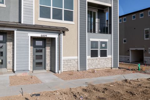 Photo of 6809 W HEART ROCK LN #289, Herriman, UT 84096 (MLS # 2134423)