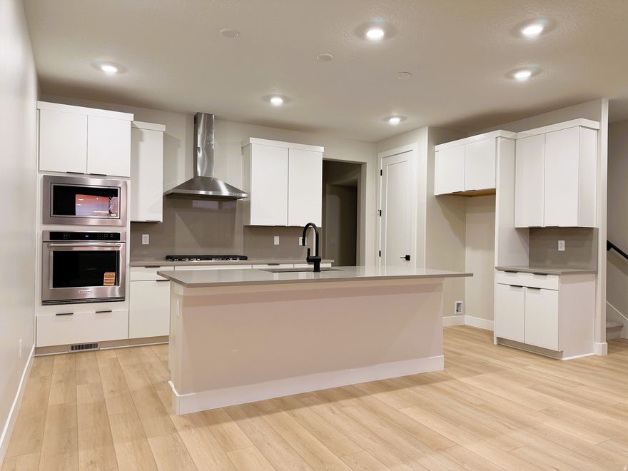 LOT #93- A beautifully finished townhome offering 4 spacious bedrooms, a chef's kitchen designed for entertaining, and a fully finished basement for added living space. Thoughtful details include stylish bathroom tile surrounds throughout and two balconies overlooking the Wasatch Mountain range, this home blends comfort, quality, and year-round adventure. This home is complete and ready for move in! . Please call or email me for more information on how to submit an offer. Buyer to verify square footage. No representation or warranties are made regarding school districts and assignments; please conduct your own investigation regarding current/future school boundaries. Sales Center Hours: Open Monday-Wednesday and Friday-Saturday from 10:00AM - 6:00PM.