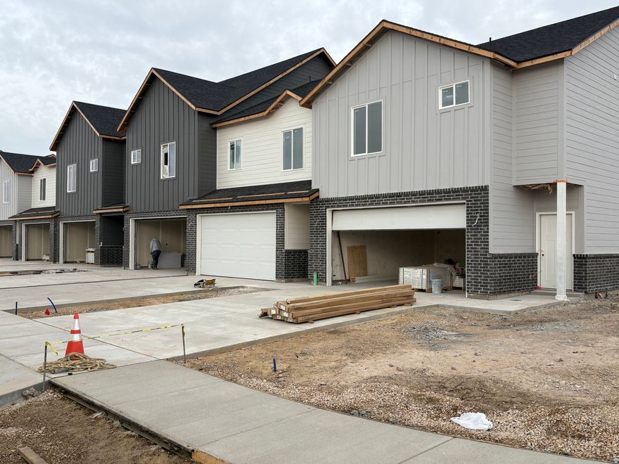 Introducing the Brand New SALT GRASS TOWNHOME SUBDIVISION in West Point!  Under Construction Now!  Step into The Vista, the center-unit home designed to bring light, openness, and sophistication to everyday living. With taller ceilings that fill the space with natural light, this floor plan transforms 1575 sq.ft. into an airy, uplifting retreat. Featuring 3 bedrooms, 2.5 baths, and a 2-car garage with full driveway, The Vista blends modern finishes with thoughtful design: quartz countertops decorative tile backsplash, luxury vinyl plank flooring and a primary suite that welcomes you to airy tranquility and elevated comfort (with 9' ceilings on the second level with 8' doors). Whether you're entertaining friends or savoring quiet moments. The Vista elevates your living experience - where every day living feels bright, expansive, and effortlessly modern. Nestled Away From The Hustle & Bustle, This Community Offer The Perfect Balance Of Tranquility & Convenience! *See Agent Remarks For Construction Updates*