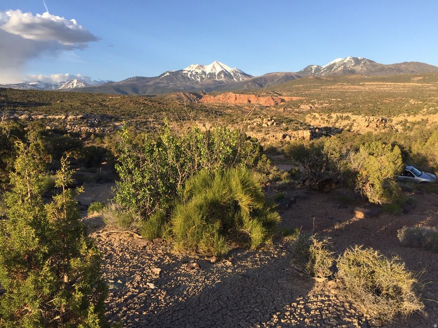 Beautiful residential/recreational property just 8 minutes from Moab, that offers fabulous desert and mountain views.  This lot, located just off Pole Canyon Road, offers striking views of the La Sal Mountains, the red fins of Behind the Rocks, Pole Canyon, and Kane Creek Canyon.  Power is conveniently located on the lot frontage.  New owner will install well and septic.  County maintained roads throughout the subdivision.  There are no HOA dues.  Sensible covenants are in place for the protection of property values. Owner financing is available.  Listing agent has partial ownership interest in lot.