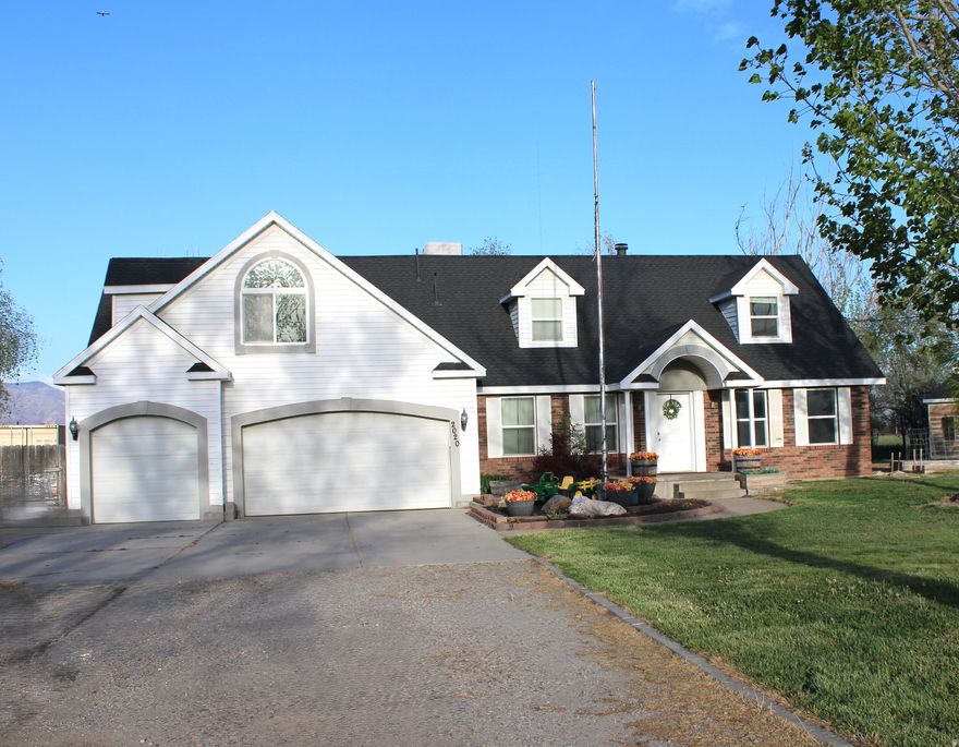 Welcome to this spacious and beautifully designed home on just under an acre! This horse property offers peaceful country living while still being a short drive to nearby shopping and schools.  Enjoy main-level living with a flexible office or bedroom on the main floor. Upstairs features four large bedrooms, a conveniently located laundry room, and an impressive primary suite you won't want to miss.  Plenty of outdoor space for animals, family, and entertaining-perfect for embracing the country lifestyle.  Schedule your showing today by contacting the listing agent.