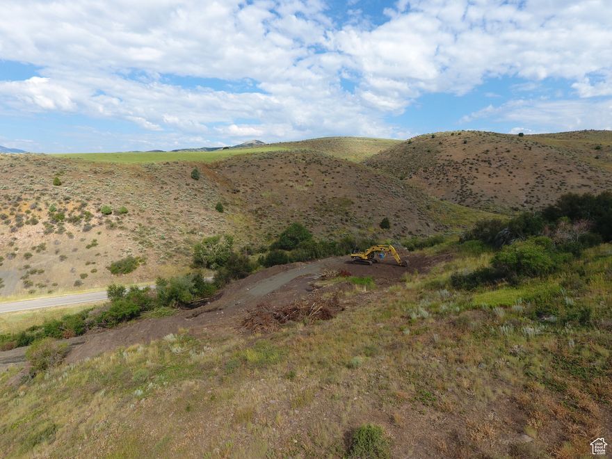 This is the northern lot in a 3 lot subdivision. This lot boasts over 6 acres and seclusion! The ideal building site sits tucked into the mountain with trees all around offering privacy and serenity. Seller is willing to make adjustments to lot lines and adjust the building site to fit your dream home. Power will be brought to the lot.  Call today for more details!