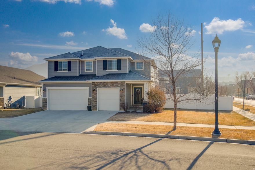 Multiple offers received. Highest and best due by 5pm Monday (1/26/26) Come be amazed by this well cared for and designer upgraded, two story, craftsman charmer in the highly sought-after Independence at the Point community near the Point of the Mountain. It offers an impressive blend of space, comfort, and modern upgrades. A corner lot with a big front yard and a huge, fully fenced (safe for children and pets) backyard.  The main level boasts 9-foot ceilings, engineered hardwood flooring, and an inviting open-concept layout. A shiplap gas fireplace and floating shelves / mantle anchors the living area, while the kitchen showcases granite countertops, upgraded stainless steel appliances, a gas range, shaker style cabinetry, unique subway tile backsplash and a large pantry. Just off the dining space, sliding glass doors lead to the east facing / shaded backyard. Watch the paragliders as you enjoy evenings in a large, exquisite backyard with a gorgeous pergola (from Notched), string lights, 2 concrete fire pits, and lots of specialty trees, flowers and plants... the perfect backyard retreat. Upstairs you will find large auxiliary bedrooms, a tiled auxiliary bathroom with shaker style cabinets & quartz vanity top and a large laundry room. The oversize master en suite features vaulted ceilings, a luxurious bathroom with separate garden tub and shower (new Euro-glass enclosure), quartz topped double vanity, and a huge walk-in closet. This property also offers fantastic community amenities. You'll find pickleball courts, picnic areas, and a large park with a splash pad perfect for kids and outdoor fun. The Point of the Mountain location is unbeatable, with quick access to I-15 (Salt Lake and Utah counties), shopping, dining, entertainment, and everything the growing Silicon Slopes corridor has to offer. There is a lot of beautiful shiplap, board and batten, framed accent walls, upgraded unique lights, Ellie Cashman wallpaper, and warm colors throughout making this home a rare, exquisite gem balancing style, function, comfort and convenience.