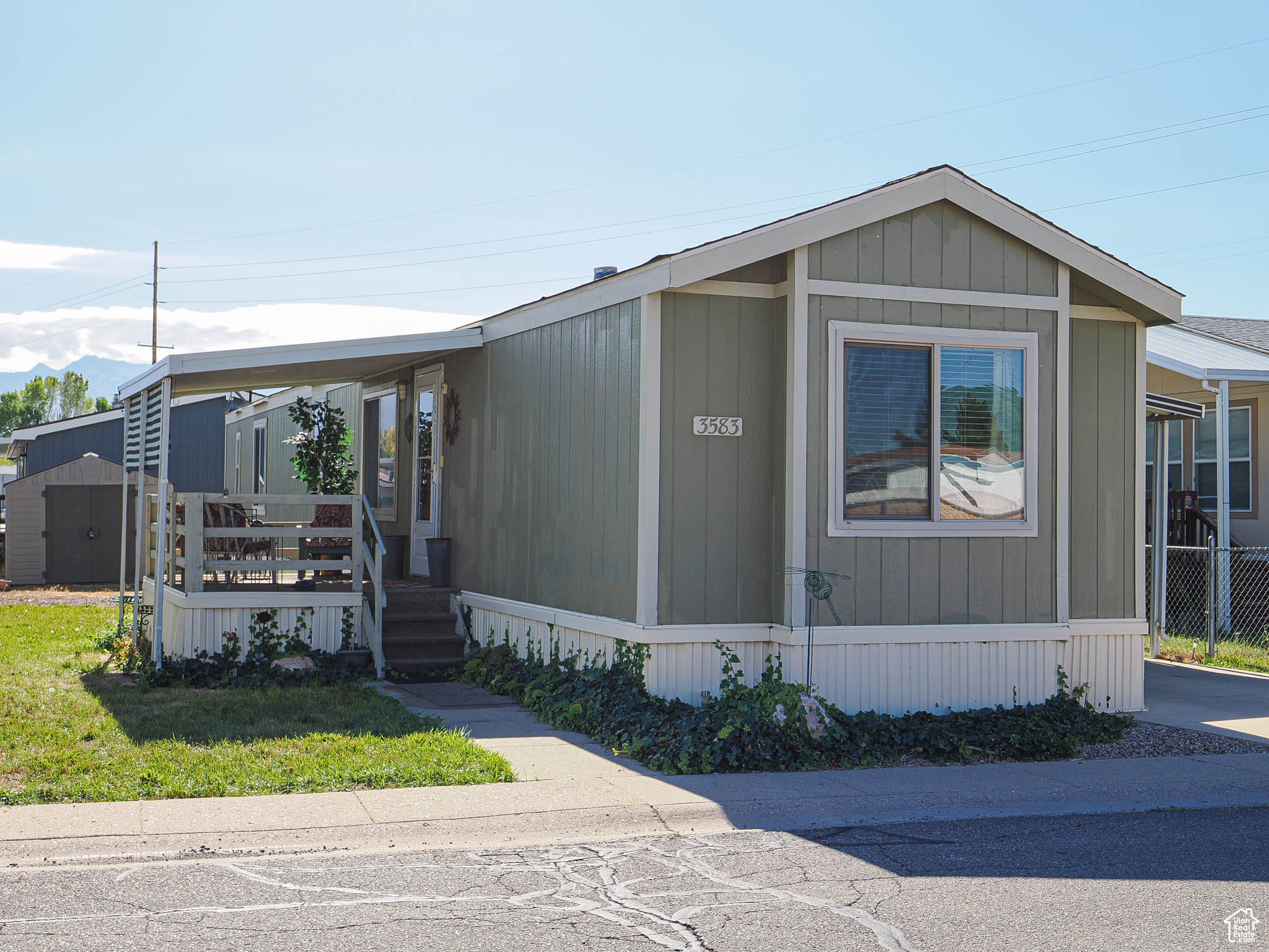 The most beautiful home in this complex with a warm and homey feel. In great condition; updated kitchen with new cabinets and beautiful built-ins, new vinyl flooring in 2019, new HVAC in 2020, new roof about 4 years ago with architectural shingles, 2 car ports that can park 3 cars, LOW rent of 710/month, 2 storage sheds and all appliances are included. Easy to show with appointment, FINANCING is available.