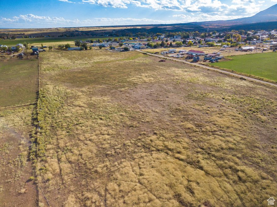 Presenting a remarkable opportunity to acquire prime land in the desirable Monticello area. This exceptional property boasts unobstructed, panoramic views of the surrounding mountain ranges, offering an inspiring backdrop for your future endeavors. The land features level, usable terrain, providing an ideal foundation for development or agricultural pursuits. Benefit from the convenience of existing utilities located at the street. Zoned AG/RES, this parcel accommodates horses, making it well-suited for equestrian enthusiasts or those seeking a rural lifestyle. 10 water shares included. Tracts A, B, C, D, and E are all parts of parcel #A33240305405 and will receive their own parcel numbers upon closing.