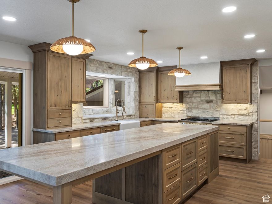 2025 FULL REMODEL!!  A whimsical escape on 1.5 acres in the heart of Eden, Utah. Blending the charm of an English cottage with luxurious modern upgrades, this 4,882 sq.ft. estate offers breathtaking panoramic views of Nordic Valley Ski Resort, right from your backyard. Boasting 5 spacious bedrooms and 5 beautifully updated bathrooms, this home is designed for comfort, entertainment, and ultimate mountain living. The walkable access to Nordic Valley Ski Resort makes it a dream for outdoor enthusiasts. Step outside to your own private oasis featuring a dedicated pickleball and basketball court, a large gazebo, and fully landscaped grounds designed for year-round enjoyment. Whether you're entertaining guests or simply soaking in the serene surroundings, this feels like a retreat!  **SELLING BARN LOT SEPARATELY - $575,000** - Adjacent buildable parcel is 1.05 acre (22-031-0005) and includes a 2-story 2,800sf barn, with an upper loft that is partially finished. All utilities in road. Perc test underway. Photos start at #55. This lot has its own private drive, and includes a natural spring well with 2 ponds. TOTAL COMBINED ACRES 2.55. Call for details.**  Square footage figures are provided as a courtesy estimate only and were obtained from county records. Buyer is advised to obtain an independent measurement.