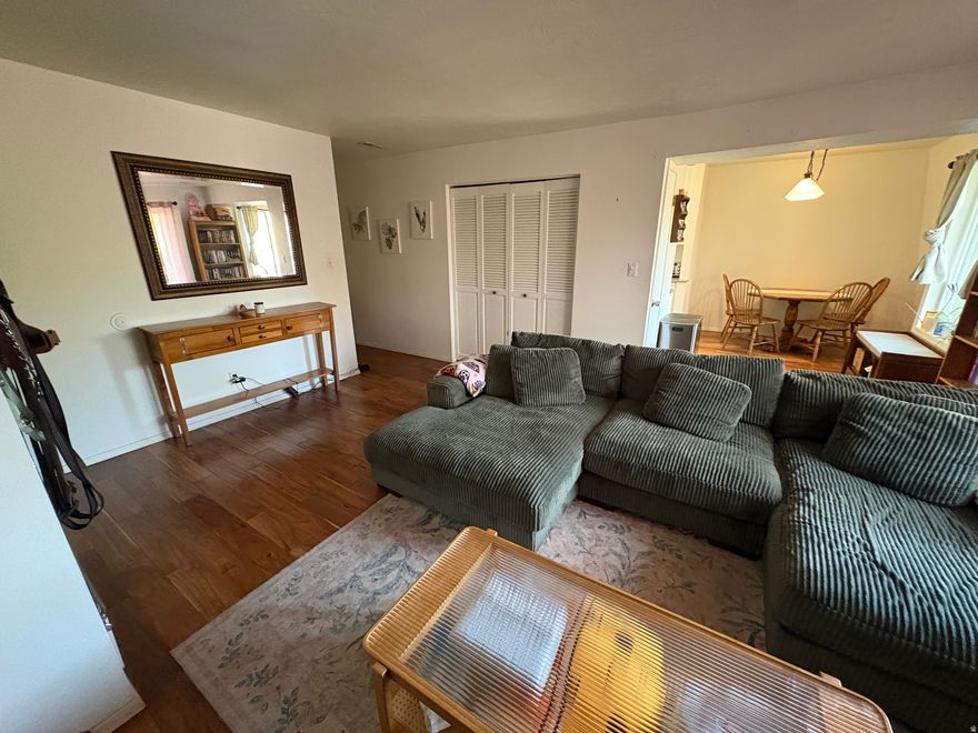 This charming 2-bed, 1-bath condo has been thoughtfully refreshed throughout featuring new kitchen cabinets, quartz countertops, new flooring, and an updated bathroom. Newer windows provide excellent natural light and improved energy efficiency, creating a bright and welcoming interior. The large bedrooms are ideal for condo living.  Enjoy a private balcony is an ideal spot for relaxing with mountain views as your backdrop, and a peaceful pond is just below. The unit is located near the clubhouse and pool, offering convenient access to community amenities, while the top-floor setting provides added privacy with only a few easy steps from the main entrance. Laundry facilities are located within the building. With its prime location close to I-15, IHC Hospital, Costco, shopping and restaurants, living here is a breeze. Thoughtful updates, and low-maintenance living, this Murray condo presents an exceptional opportunity for first-time buyers, downsizers, and investors alike.