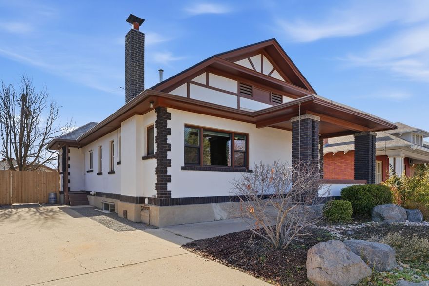 Welcome to Sugarhouse, one of Salt Lake City's most iconic areas! This beautiful craftsman-style bungalow seamlessly blends the classic charm of 1923 with modern upgrades. Original in-laid hardwood floor & a fully functioning Art Deco fireplace welcome you into the formal living room. The completely remodeled kitchen features Cafe appliances with a gas range, quartzite counters, custom cabinets with champagne brass handles & an exposed brick accent. Appreciate the traditional layout with 4 bedrooms, 2 bathrooms & a full height basement. Updated electrical, plumbing, Furnace & AC 2022, water heater 2024. Potential MIL. Outside, the fully fenced xeriscaped yard with a front porch & back patio, is the perfect escape. Oversized shed has great storage. Room to build a garage. Walking distance to shopping & eateries along 21st South and convenient freeway access. Come see for yourself the beauty of 854 Westminster Avenue!