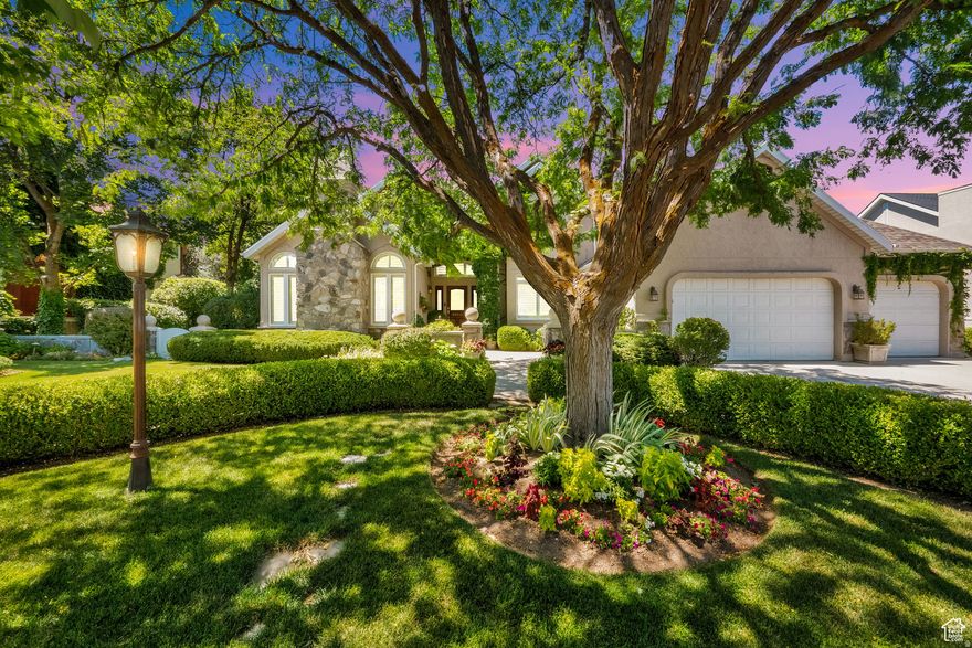 Nestled within one of the area's most beautiful and established neighborhoods, this exceptional residence offers the perfect blend of classic elegance, generous space, and serene privacy, all just minutes from top-rated schools, scenic walking trails, near Little Cottonwood Creek, Crestwood Park with swimming pool, Pickleball courts and pristine parks. This secluded neighborhood offers a peaceful ambiance and a sense of enduring quality that few communities can match. This spacious traditional-style home perfectly blends timeless charm with everyday comfort. Inside you'll find beautiful arched windows with plantation shutters, arched doorways, rich hardwood floors, and vaulted ceilings create a warm and inviting atmosphere. The kitchen is both functional and beautiful, featuring granite countertops, stainless steel appliances, and plenty of room for gathering. The seamless floor plan offers space to spread out and relax, including an elegant and expansive master en-suite retreat with sitting area and fireplace. Step outside to an immaculate, fully landscaped yard that is truly a dream, complete with a charming gazebo, lush garden, and a covered back porch ideal for relaxing or entertaining in total privacy. The home has been meticulously cared for with a new roof, dual furnaces, and dual water heaters, two AC's, ensuring comfort and peace of mind for years to come. This is a rare opportunity to own a stunning, move-in-ready home in a neighborhood that continues to stand the test of time!