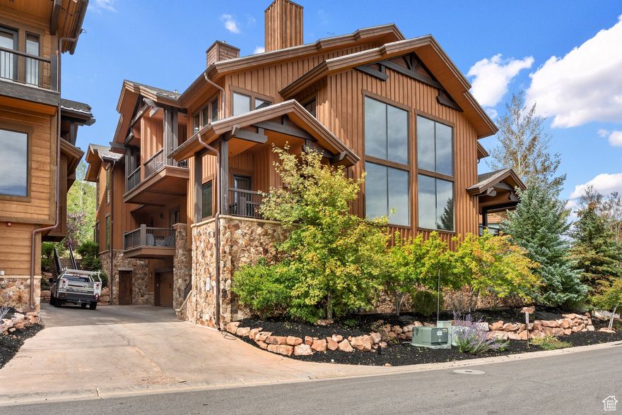 Welcome to the epitome of Park City vacation living at Juniper Landing. This exceptional townhome-style condo offers the ultimate blend of luxury, convenience, and year-round recreation. Located in the heart of Canyons Village, it provides unrivaled ski access, with a short walk to the private Frostwood Gondola. Beyond skiing, this location is a haven for outdoor enthusiasts. Spend your summers hiking and biking on nearby trails, or enjoy a round of golf at Canyons Village. For a relaxing evening, take a stroll next door to the Waldorf's Restaurant for dinner. The townhome itself is a sanctuary of comfort and style. It features timeless finishes, high ceilings, and beautiful wood flooring. You'll find three natural stone gas fireplaces, providing warmth and ambiance, along with en-suite bathrooms for every bedroom. The kitchen is equipped with high-end appliances, and the home boasts a spacious walk-in laundry room and plantation shutters throughout. Massive windows with motorized shades fill the space with natural light. Owners have invested in significant upgrades, including a spacious ski prep room with heated floors and ample storage, an enlarged deck, and a private hot tub area complete with a TV. This thoughtful design ensures you can easily unwind and melt the day's activities away. In addition to your private hot tub, you'll have access to Juniper Landing's fantastic amenities, including a heated outdoor saltwater pool, a hot tub, a fire pit, and a fitness center. The property is sold furnished, making it a seamless transition into your new home. This is the perfect ski and summer property you've been searching for.