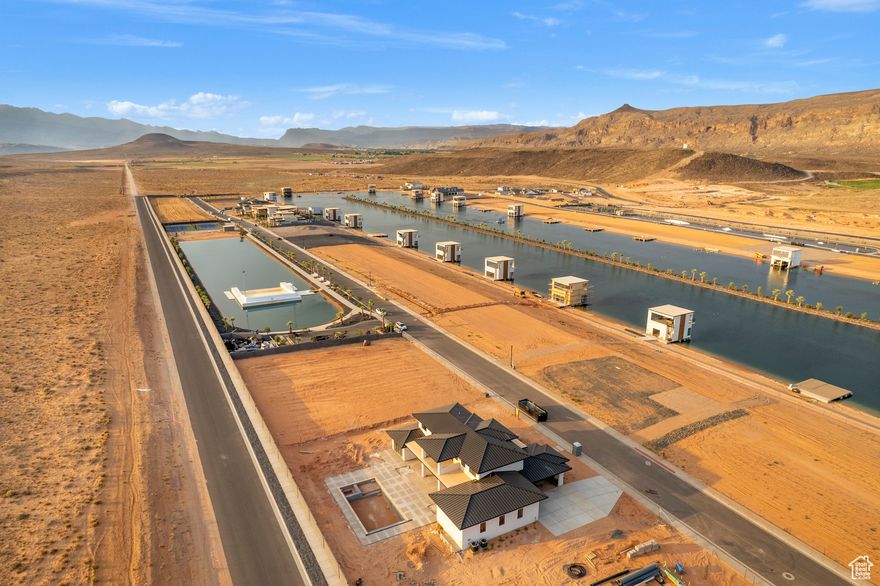 Build your dream home in Southern Utah's premier gated lakefront community, Southern Shores. This half-acre, build-ready lot sits just steps from the private surf lake and beach, offering the feel of lakefront living without the price tag. Enjoy full access to the surf pool, cable lake, pickleball/tennis courts, and more. Take in stunning views of Pine Valley Mountain and the Hurricane Cliffs, with top-tier golf and reservoirs just minutes away. This is lake life, elevated. SELLER FINANCING AVAILABLE!