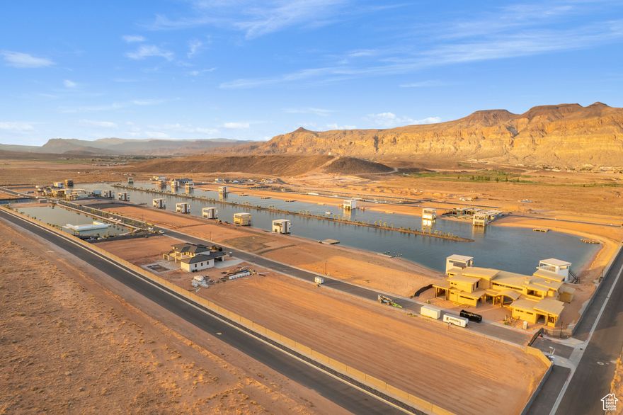 Build your dream home in Southern Utah's premier gated lakefront community, Southern Shores. This half-acre, build-ready lot sits just steps from the private surf lake and beach, offering the feel of lakefront living without the price tag. Enjoy full access to the surf pool, cable lake, pickleball/tennis courts, and more. Take in stunning views of Pine Valley Mountain and the Hurricane Cliffs, with top-tier golf and reservoirs just minutes away. This is lake life, elevated. SELLER FINANCING AVAILABLE!